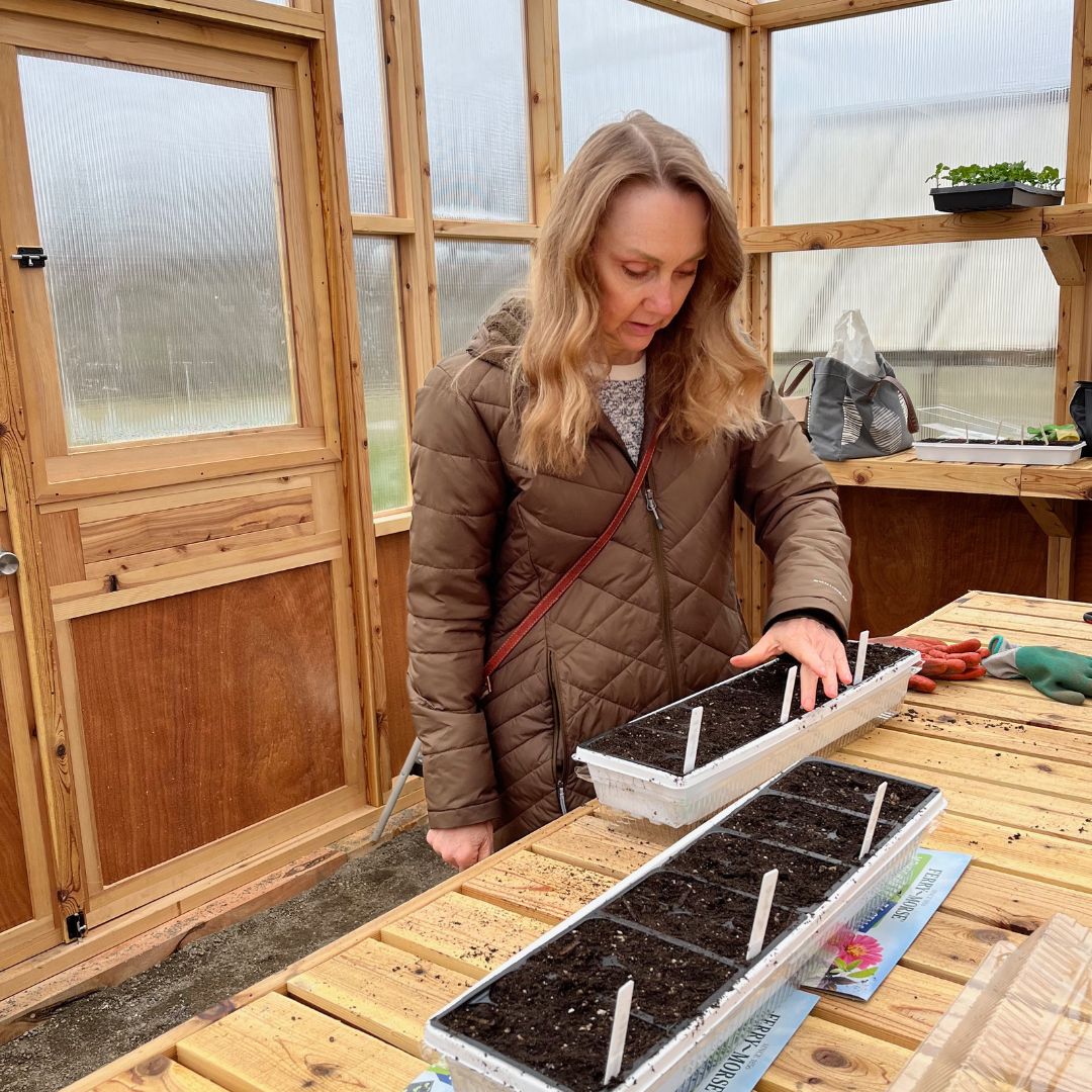 Lori Osterberg, founder of Gorgeous Wellth, planting the seeds for this year's plant-based garden